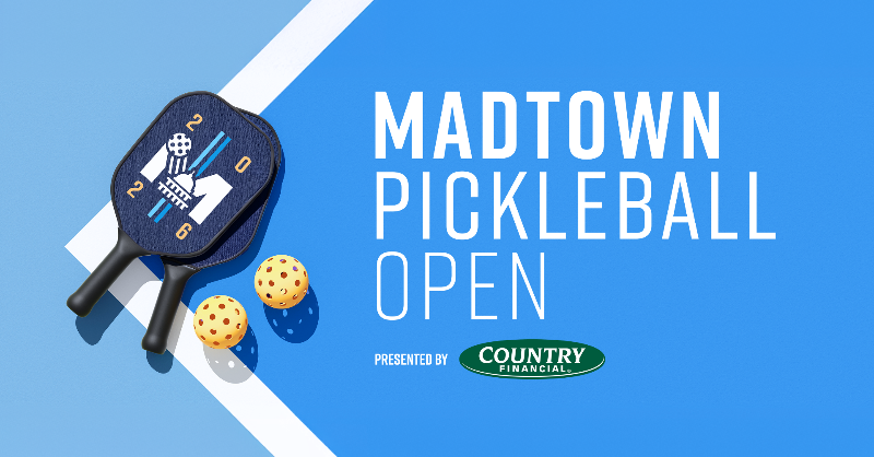 A pickleball paddle and two balls on a blue court with text: “Madtown Pickleball Open presented by Country Financial.”.